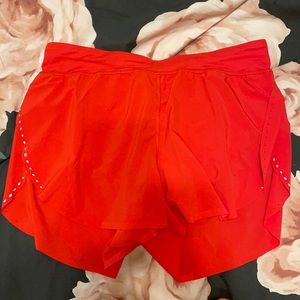 Find your pace high rise 3” shorts carnation red